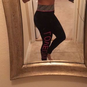 Black and hot pink workout pants